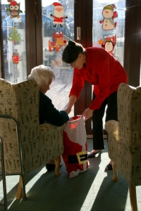 Ethel and Christine looking through the Santa sack